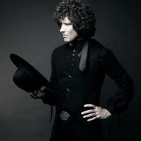 Обложка Enrique Bunbury