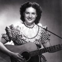 Обложка Kitty Wells